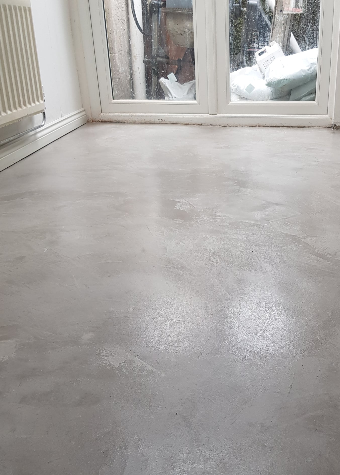 Dining room floor covered with Venetian Plastering